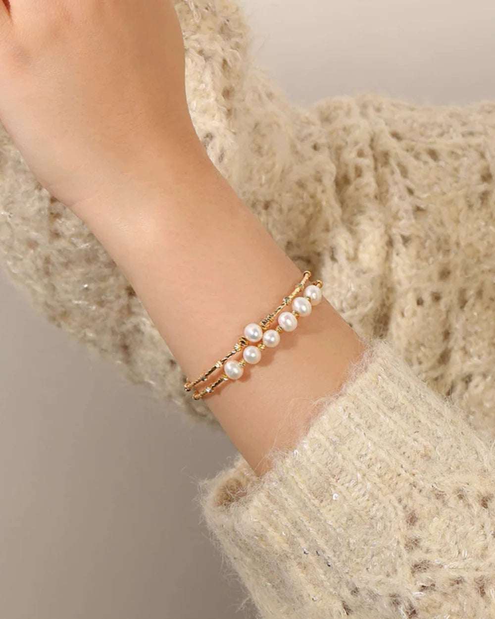 Elegant freshwater pearl bracelet with single-strand design on wrist