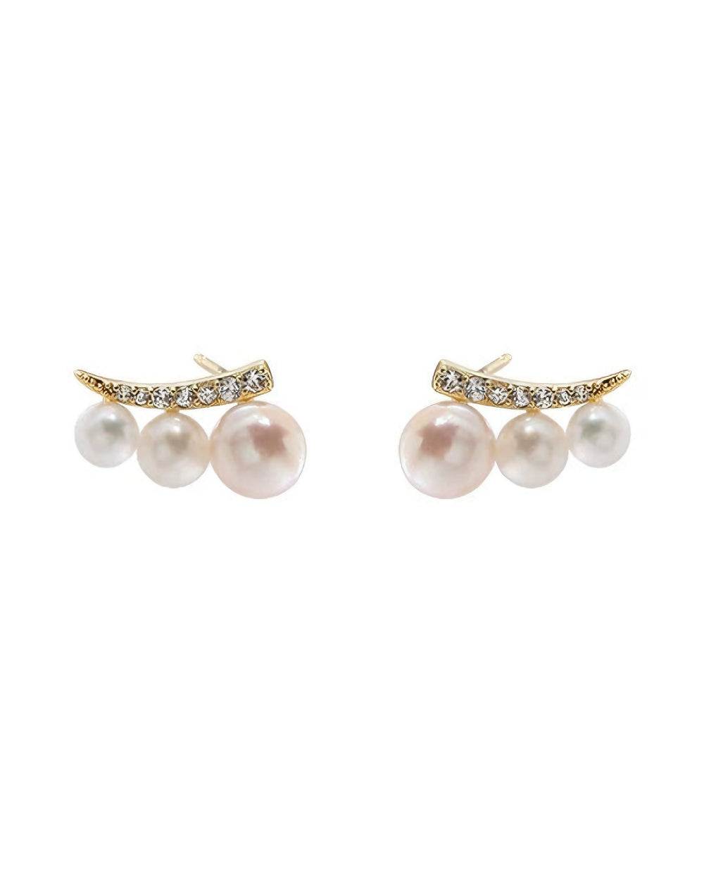 Angel wing freshwater pearl stud earrings with delicate, minimalist design and luminous natural pearls