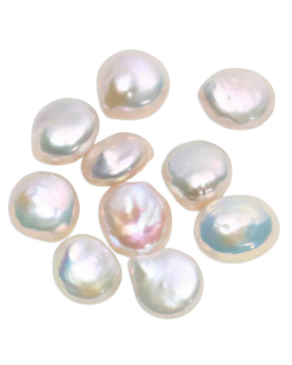 Collection of freshwater pearls on a white background