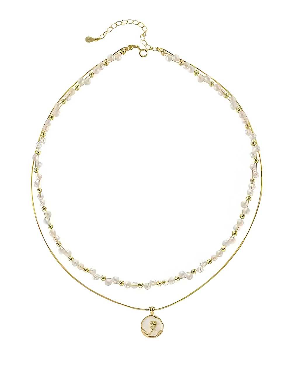 Two layered necklaces with pearls and gold accents on a white background